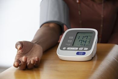 Patient checking blood pressure