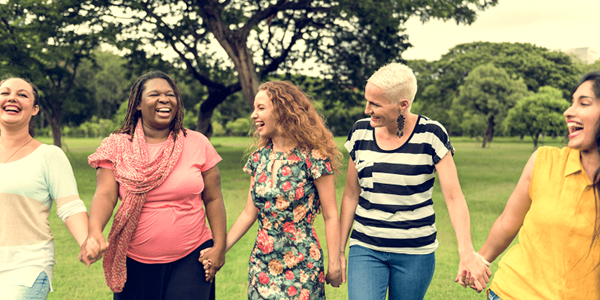 group of women socializing and happy group of women socializing and happy
