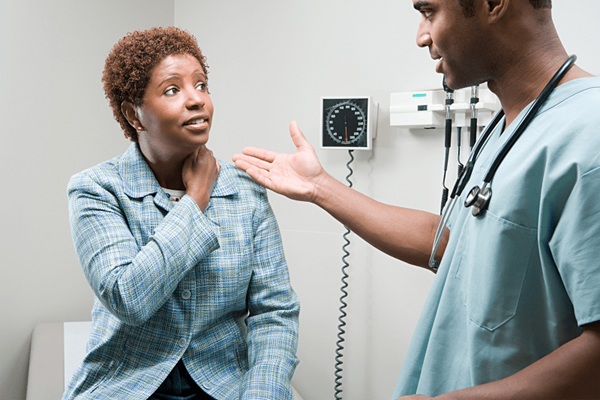 woman talking to doctor woman talking to doctor