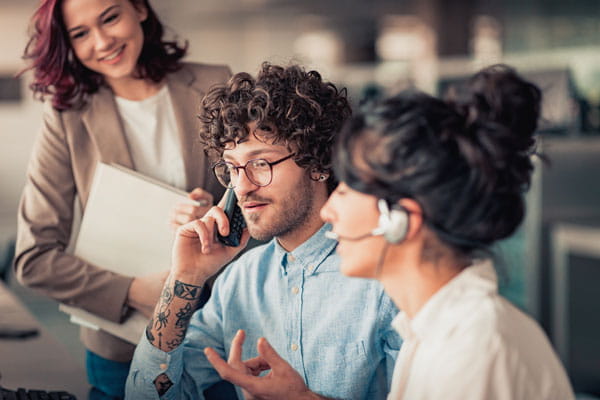 Team of people working at a call center
