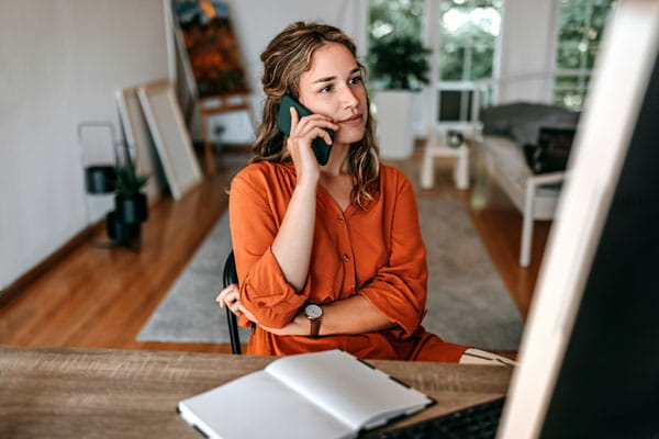 Young woman engaged in phone conversation