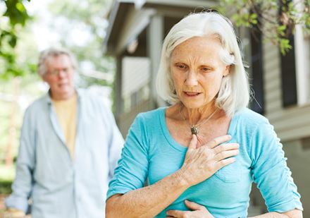 senior woman with chest pain senior woman with chest pain