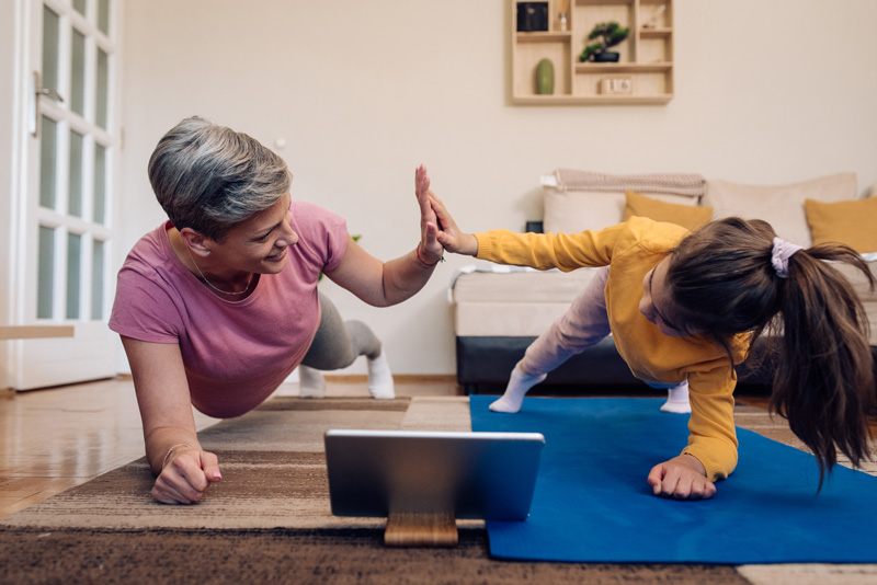 High five with grandmother and granddaughter