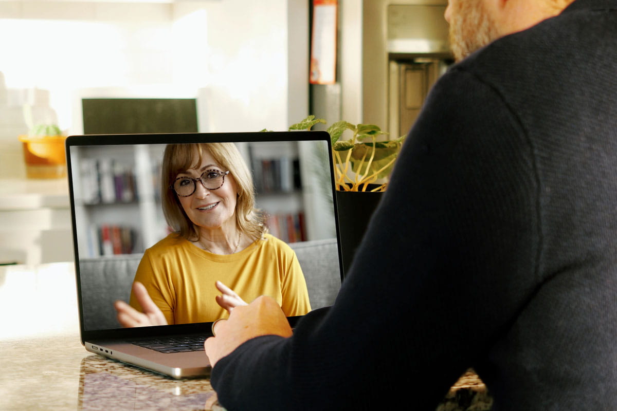 Man and woman video calling