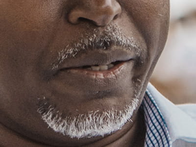 Close-up of an older man's mouth