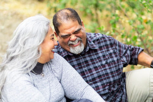 smiling couple at park