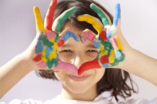 child painted hands sign heart