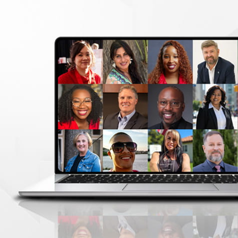 A colorful grid of diverse faces on a laptop screen.